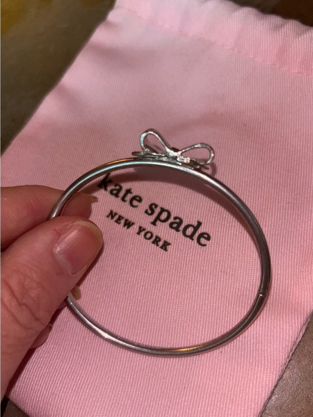 kate spade Silver Bow Bangle Bracelet with Pink Pouch